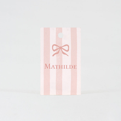 Etiquette nœud rose sur fond ligné  (535.040)